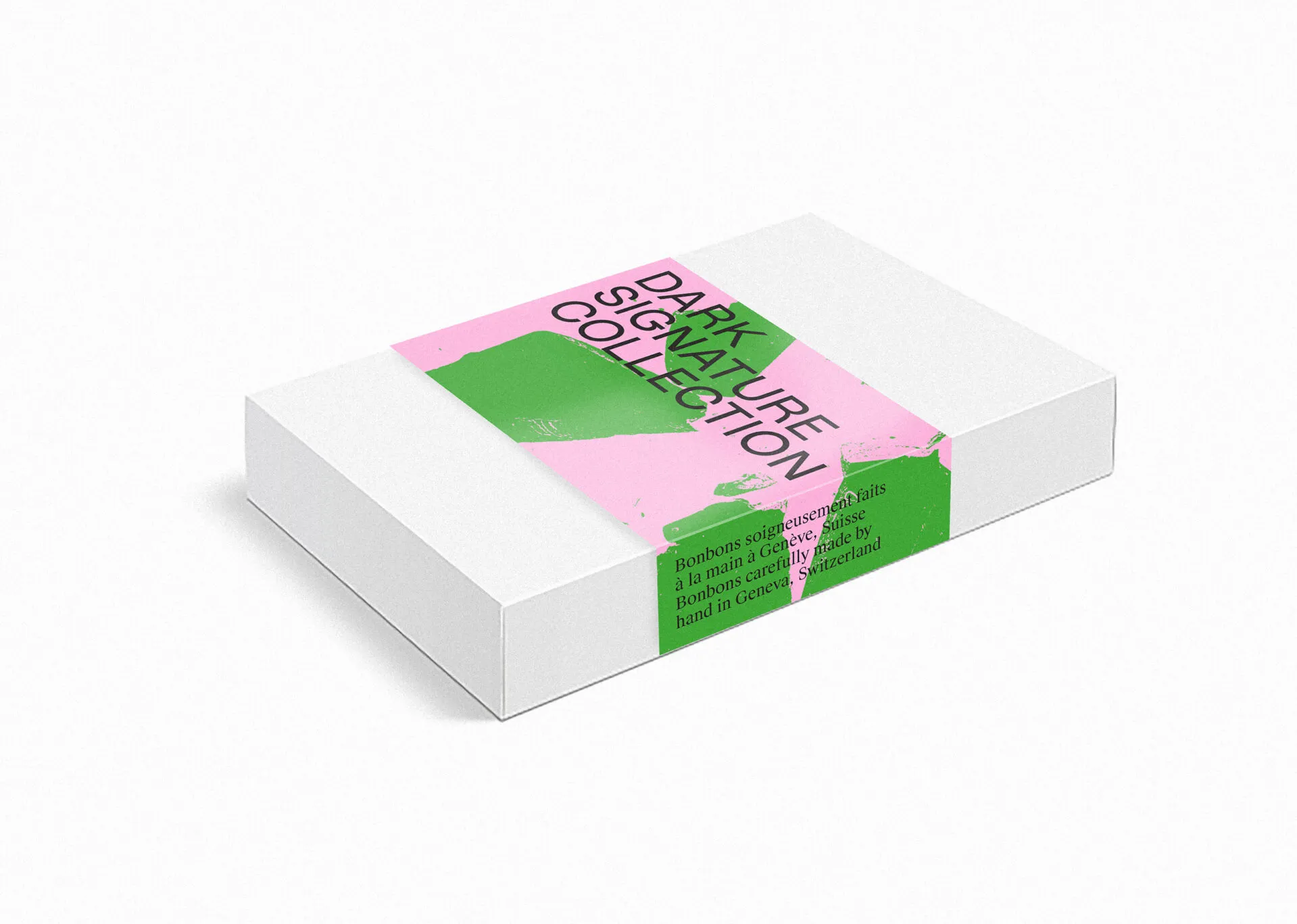 Boîte de chocolats Favarger Dark Signature Collection au bandeau rose et vert